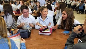 Students Aaron Marentette, left, Taylor Jones and Melissa Montaleone  take part in the Mix it up Lunch at Villanova high school in LaSalle, Ont., on Tuesday, October 30, 2012. The projects asked students to sit and talk with someone they didn't know over the lunch hour.              (TYLER BROWNBRIDGE / The Windsor Star)