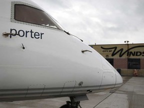 In this file photo,  a Porter Airlines Bombardier Q400 lands at Windsor International Airport for a trial run, Saturday, April 16, 2011.