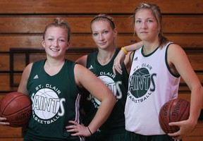 St. Clair sisters Katie Rizea, from left, Kendyl Rizea and Kelly Rizea are members of the St. Clair women's basketball team. (DAX MELMER/The Windsor Star)