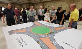 Member of the public get a lesson on driving in a traffic circle at the Macedonian Centre in Windsor, Ont. on Thursday, October 4, 2012.  (TYLER BROWNBRIDGE / The Windsor Star)