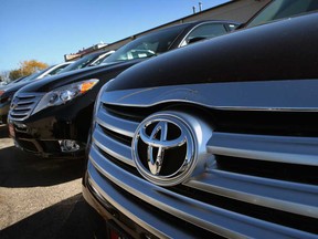 Toyota vehicles sit for sale at Northbrook Toyota on October 2, 2012 in Northbrook, Ill. Toyota sales in September rose 42 per cent from a year earlier. Chrysler had a 12 per cent increase while Ford and General Motors sales were mostly flat. (Photo by Scott Olson/Getty Images)