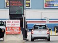 A motorist prepares to pay at a toll booth on the Canadian side of the Detroit-Windsor tunnel on Oct. 30, 2012. (Jason Kryk / The Windsor Star)