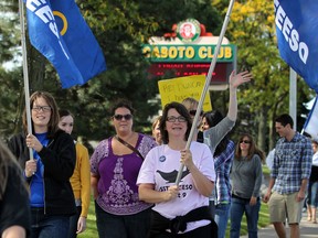 OSSTF occasional teachers conduct a protest as Hon. Dwight Duncan, Ontario Minister of Finance, speaks during Windsor-Essex Regional Chamber of Commerce Distinguished Speaker Series at Giovanni Caboto Club of Windsor Friday September 21, 2012.  (NICK BRANCACCIO/The Windsor Star)