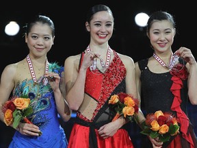 Canada's Kaetlyn Osmond, centre, won the gold medal at the ladies competition at Skate Canada International at the WFCU Centre Saturday.  The silver medallist was Japan's Akiko Suzuki and the bronze medallist was Kanako Murakami of Japan. (Dave Reginek/Getty Images)