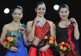 Canada's Kaetlyn Osmond, centre, won the gold medal at the ladies competition at Skate Canada International at the WFCU Centre Saturday.  The silver medallist was Japan's Akiko Suzuki and the bronze medallist was Kanako Murakami of Japan. (Dave Reginek/Getty Images)