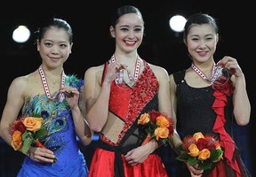 Canada's Kaetlyn Osmond, centre, won the gold medal at the ladies competition at Skate Canada International at the WFCU Centre Saturday.  The silver medallist was Japan's Akiko Suzuki and the bronze medallist was Kanako Murakami of Japan. (Dave Reginek/Getty Images)