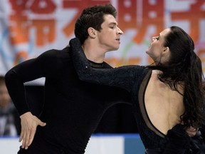 University of Windsor student Tessa Virtue, right, and Scot Moir perform their free dance to win the gold medal in the ice dance competition at Skate Canada International at the WFCU Centre. (CANADIANPRESS/Paul Chiasson)