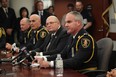 Right to left: New Windsor Police  deputy chief of operations Vince Power, OPP Insp. Rick Derus -currently head of the Essex OPP,  who will become deputy chief of administration in November,  Windsor Police chief Al Frederick, and retiring deputy chief Jerome Brannigan during an afternoon press conference at Windsor Police Headquarters on October 11, 2012. (JASON KRYK/ The Windsor Star)