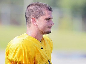 Lancers wide receiver Jordan Brescacin takes a break at football practice at Alumni Field. (DAN JANISSE/The Windsor Star)