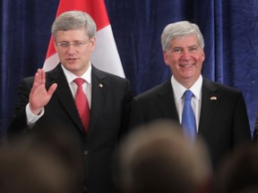 In this file photo, Prime Minister Stephen Harper and Michigan Gov. Rick Snyder announce plans for the new Windsor-Detroit bridge June 15, 2012.  (Windsor Star / TYLER BROWNBRIDGE)