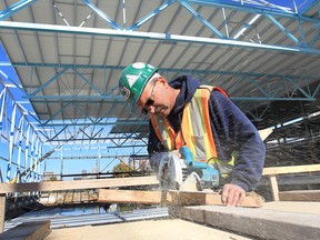 Wayne Dutka, a member of the Carpenters Local 494 Union that has welcomed new projects to the area. He is pictured Thursday, Oct. 11, 2012, at the Aquatic Centre construction site in downtown Windsor, Ont.(DAN JANISSE/ The Windsor Star)