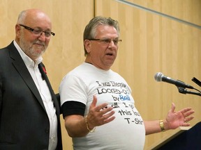 Canadian Auto Workers president Ken Lewenza (right) and Communications, Energy and Paperworkers Union of Canada president Dave Coles attend a news conference in Quebec City on Oct.15, 2012. (THE CANADIAN PRESS/Clement Allard)