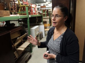 Madelyn Della Valle. Curator at Windsor's Community Museum walks in the basement of the downtown Windsor museum on October 2, 2012.  (JASON KRYK/ The Windsor Star)