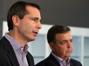 Premier Dalton McGuinty and Finance Minister Dwight Duncan  address the media following a tour of the Dr. David Suzuki school  in Windsor on August 9, 2012.   (The Windsor Star / TYLER BROWNBRIDGE)