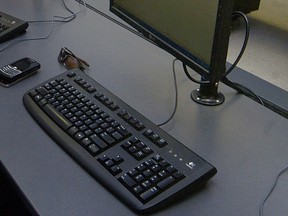 File photo of computer keyboard and mouse. (Postmedia News files)