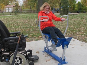 -Lydia Williams, who uses a wheelchair because of her multiple sclerosis, tried the outdoor rowing machine on Friday, Oct. 19, 2012 at the Optimist Park in Lakeshore. The rowing machine is one of six pieces of outdoor exercises equipment in the park purchased to help seniors stay fit. (The Windsor Star-Monica Wolfson)