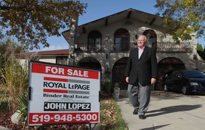 Frank Binder, Broker of Record for Royal LePage Binder Real Estate,  stands outside a home for sale at 156 Hayes Avenue in Tecumseh, Ontario on October 18, 2012.