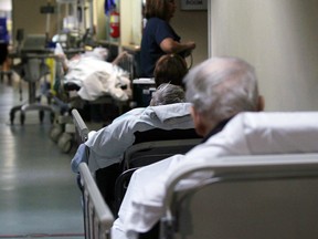 A patients are lined up  in the emergency department hallway at Windsor Regional Hospital in Windsor, Ontario in this 2011 file photo. (JASON KRYK/ The Windsor Star)