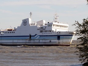 In this file photo, the Canadian Coast Guard completes a rescue of passengers on board the Jiimaan after the Pelee Island ferry ran aground in Lake Erie near Kingsville, Ontario on October 11, 2012.
