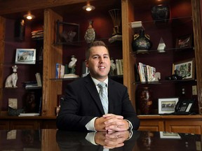 Financial planner Joshua Lane at the offices of Kaspardlov, Laverty and Associates in Windsor on Oct. 3, 2012. (TYLER BROWNBRIDGE / The Windsor Star)