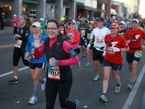 In this file photo, participants in the 35th annual Detroit Free Press Marathon run east along Riverside Drive West in Windsor, Ont., Sunday, Oct. 21, 2012.  (DAX MELMER/The Windsor Star)