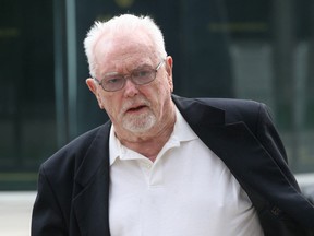 Rev. William Hodgson Marshall makes his way to the Superior Court building in Windsor, Ont. in this June 2011 file photo. (Dan Janisse / The Windsor Star)