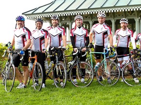 Windsor police officers pose for a photo on Parliament Hill in Ottawa at the end of their four-day 640-kilometre charitable bicycle ride. Photographed Sept. 30, 2012. From left: Glenn Gervais, Celia Gagnon, Will Hodgins, Reggie Mollicone, William Donnelly, John Saul and Heather McPhee. (Handout / The Windsor Star)