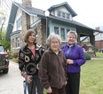 Margaret Haag Smith, centre, is shown with her daughters Sue Smith Barnhizer, left, and Lynn Smith Beard, right, as the 95-year-old visits the Windsor home where she was born. (JASON KRYK /  The Windsor Star)