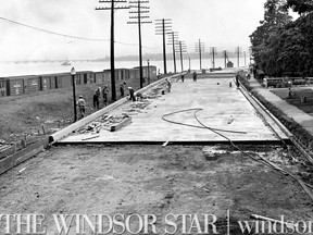 July 15/1953- Work on the huge $275,000 rebuilding program on sandwich St. from Lincoln to Goyeau is progressing. (The Windsor Star-Jack Dalgleish)