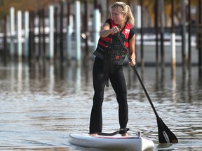 Windsor Star reporter Kelly Steele spent a few hours at the Puce marina learning how to stand-up paddle board. (DAX MELMER / The Windsor Star)