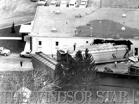 28/170-It was a sudden intrusion when a derailed railway car left the C. and O. tracks and crashed into the south end of the Lt-Col. Fred Jasperson Branch of the Royal Canadian Legion at Kingsville . (The Windsor Star-Cec. Southward)