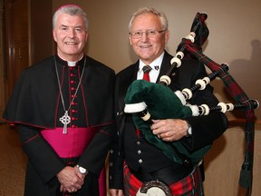 Bishop Bill McGrattan with piper Walter Meixner at Ninth Annual Bishop's Dinner and Centenary Gala supporting and celebrating 100 years of St. Peter's Seminary at the Ciociaro Club of Windsor, Nobember 1, 2012. (NICK BRANCACCIO/The Windsor Star)