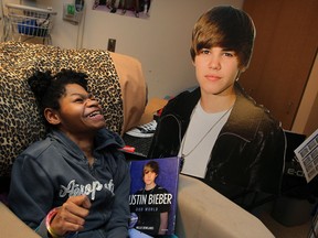 Tanisha, 14, is a huge fan of Justin Bieber and staff at Windsor Regional Hospital's Met Campus are hoping the mega pop star could pay a visit.  Severely disabled since birth and a ward of the Children's Aid Society, Tanisha has a life-sized cutout of Bieber and plenty of Bieber material in her room at Met, November 12, 2012.  (NICK BRANCACCIO/The Windsor Star)
