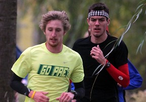 St. Clair's Andrew deGroot, right, won the first national cross-country championship Saturday in Saints history. (NICK BRANCACCIO/The Windsor Star)