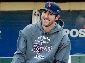 Tigers pitcher Justin Verlander sits in the dugout before Game 4 of their American League division baseball series against the Oakland Athletics. (AP Photo/Marcio Jose Sanchez).