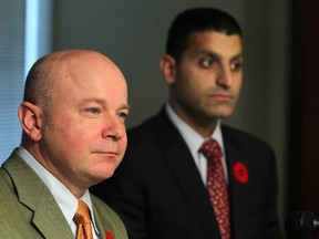 Chris Wederman, left, executive vice-president of Autodata Solutions, is joined by Mayor Eddie Francis as they  announce the opening of an Autodata Solutions office coming to Windsor, Ont. while at a press conference at the 400 building, Monday, Nov. 5, 2012.  (DAX MELMER/The Windsor Star)