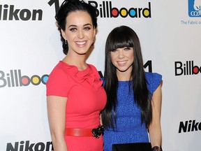 "Woman of the Year" honoree Katy Perry, left, and "Rising Star" honoree Carly Rae Jepsen pose together at Billboard's "Women in Music 2012" luncheon at Capitale on Friday Nov. 30, 2012 in New York. (Photo by Evan Agostini/Invision/AP)