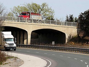 The bridge over Hwy. 401 for westbound Hwy. 3 traffic shown is this March 2012 file photo, will be torn down this weekend. (NICK BRANCACCIO/The Windsor Star)