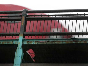 Holes are pictured in the Ambassador Bridge between Donnelly Street and Wyandotte Street West in Windsor, Ont., Monday, Nov. 12, 2012.  (DAX MELMER/The Windsor Star)