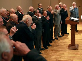 Members of Il Coro Italiano of Windsor toast their final performance at the Caboto Club, Sunday, Nov. 4, 2012.  (DAX MELMER/The Windsor Star)