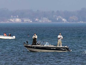 Fishermen try their luck on Lake St. Clair off the shore of Sandpoint Beach in Windsor, Ont. on Thursday, November 22, 2012.                  (TYLER BROWNBRIDGE / The Windsor Star)