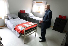 In this file photo,  Greg Goulin, president of the Windsor Residence for Young Men, leads a group of media on a tour of his group home for homeless young men in Windsor on Monday, October 1, 2012.           (TYLER BROWNBRIDGE / The Windsor Star)