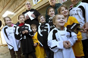 Callum Savard, right, talks to the media during a fundraiser announcement for the Knobby's Kids Hockey program in Windsor, Ont. on Wednesday, November 21, 2012. The organization was presented with a cheque for $5,000 by the St. Clair College Alumni Association.                  (TYLER BROWNBRIDGE / The Windsor Star)