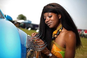 In this file photo, Maxine Ebegbuzie of Nneka's Essentials International, is shown at the LaSalle Strawberry festival, Saturday, June 4, 2011. Ebegbuzie is selling bling car eyelashes that can be attached to your car's headlights.  (DAX MELMER / The Windsor Star)
