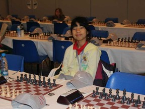 Lily Zhou, 10, at the World Youth Chess Championship in Maribor, Slovenia. (Handout)