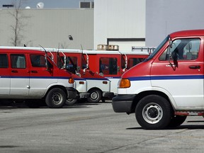 Canada Post vehicles are seen in this file photo. (Tyler Brownbridge/The Windsor Star)