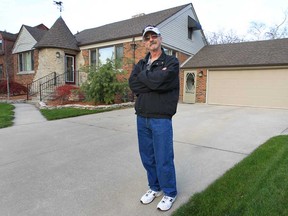Dennis Evon poses Thursday, Nov. 8, 2012, in front of his home in the 200 block of Reedmere Road in Windsor, Ont. His property assessment has jumped $34,000 in the past four years, something he thinks is unfair.  (DAN JANISSE/The Windsor Star)