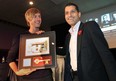 Techno artist Richie Hawtin, left, receives the ceremonial keys to the city from Windsor Mayor Eddie Francis, Wednesday, Nov. 7, 2012, at the University of Windsor.  (DAN JANISSE/The Windsor Star)