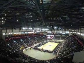 A screen grab from a YouTube video showing the transformation of the WFCU Centre from a hockey rink to a basketball court.