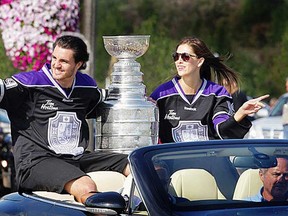 In this file photo, L.A. Kings player Kevin Westgarth and his wife Meagan arrive at the United Communities Credit Union complex in Amherstburg, Ont. Tuesday, Aug. 21, 2012, with the Stanley Cup. (DAN JANISSE/ The Windsor Star)